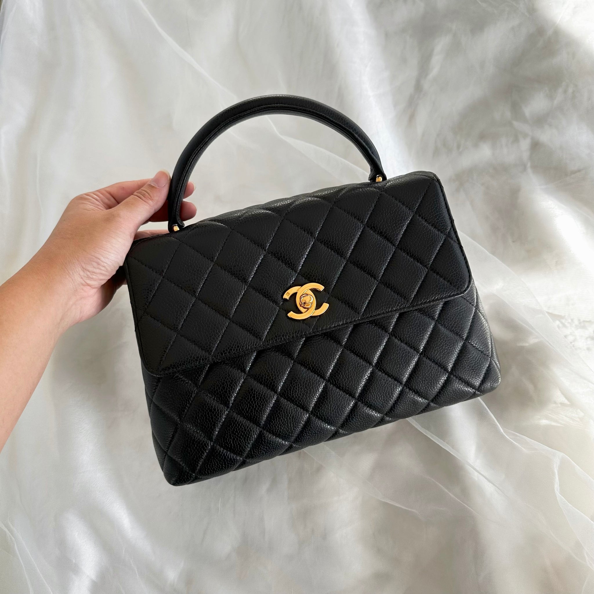 Vintage small kelly caviar in black 24k GHW